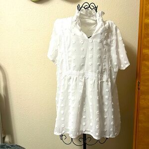 Fresh white blouse with a nice pattern